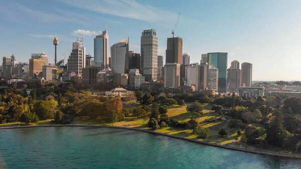 SYDNEY, AUSTRALIA - AUGUST 20, 2018: Aerial panoramic view of city harbour. Sydney attracts 20 million tourists annually.