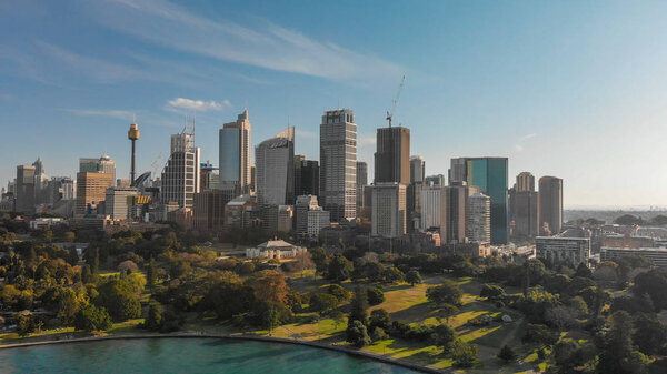 SYDNEY, AUSTRALIA - AUGUST 20, 2018: Aerial panoramic view of city harbour. Sydney attracts 20 million tourists annually.