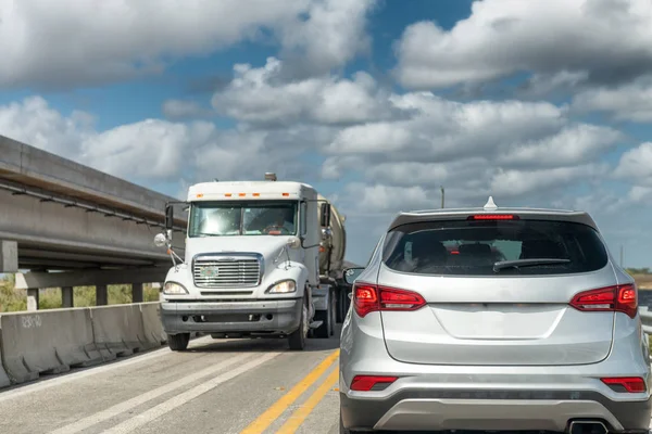 Cars and truck traffic along Overseas Highway, Florida.