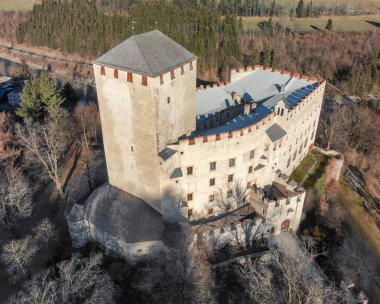 Aerial view of Lienz Castle and valley in winter season, Austria. clipart