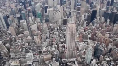 NEW YORK CITY - DECEMBER 2018: Aerial view of Empire State Building and Midtown Manhattan aerial skyline from helicopter