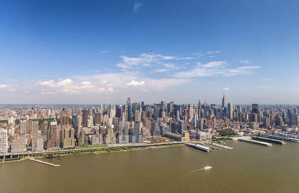 Central Park and Midtown Manhattan aerial view on a sunny day, New York City