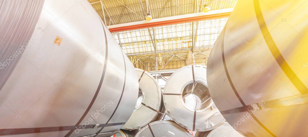 Industrial warehouse with rolls of steel sheet in a plant galvan