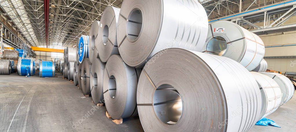 Industrial warehouse with rolls of steel sheet in a plant galvan