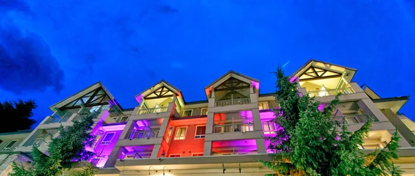 Colorful mountain homes at night