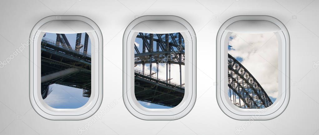 Sydney Harbor Bridge structure as seen from three airplane windo