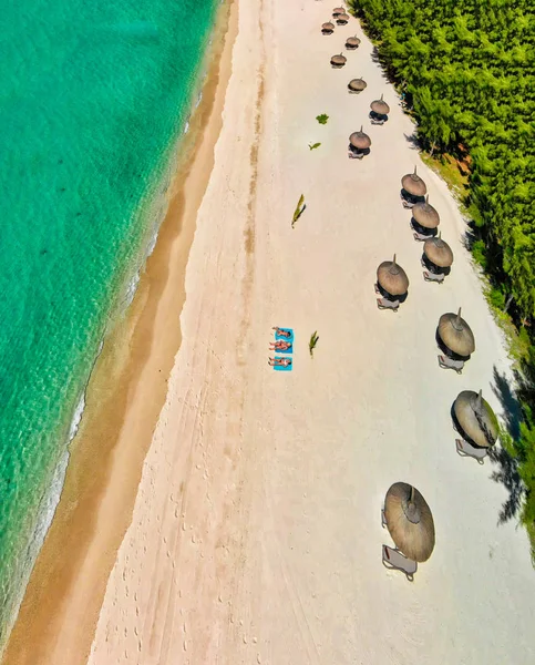 Overhead aerial view of beautiful beach with vegetation