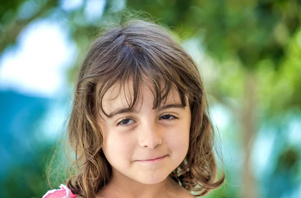 Young girl making grimaces outdoor — Stock Photo, Image