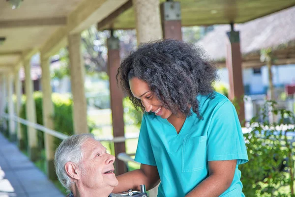 Senior Man Wheelchair His Caregiver Garden — Stock Photo, Image