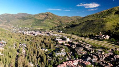 Buildings in Vail, Colorado. Aerial view on a sunny summer morni clipart