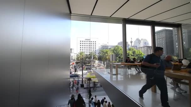 footage of crowd of people in Apple store, USA