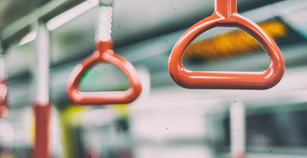 Punhos do trem do metrô, foco raso — Fotografia de Stock