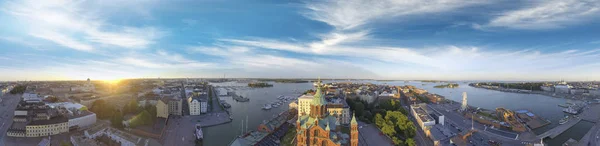 Panoramic sunset aerial view of Helsinki skyline from city port