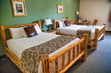 CODY, WY - JULY 6, 2019: Wooden hotel home interior. Many hotels clipart
