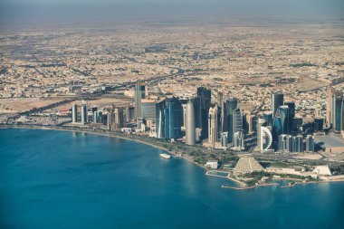 Doha, Qatar. Aerial view of beautiful modern skyline from a movi clipart