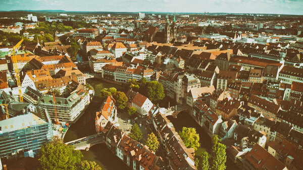 Nuremberg, Germany. Drone aerial view from a vantage viewpoint along city river.