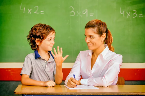 Teacher Interviewing Young Boy School — Stock Photo, Image