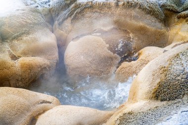 Biscuit Basin boiling pool in Yellowstone National Park. clipart