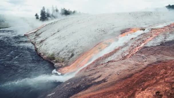 Outlet of the Excelsior Geyser in the Firehole River with mineral deposits, Midway Geyser Basin - Yellowstone National Park, WY - USA — Αρχείο Βίντεο