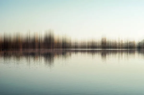 Picturesque Blurred View Forest Blue Sky Reflecting Mirror Surface Lake — Stock Photo, Image