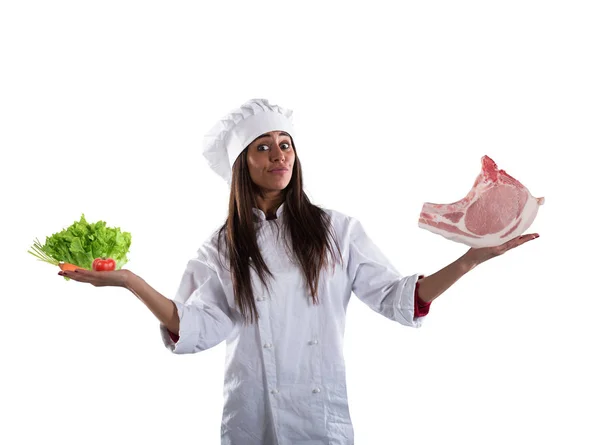 Chef undecided between fresh salad or meat steak. concept of vegetarian — Stock Photo, Image