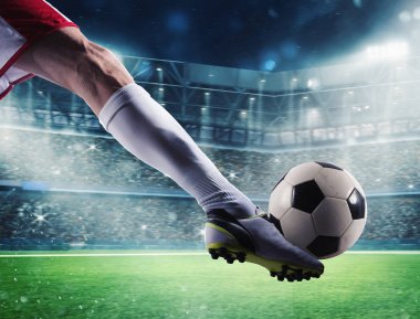 Soccer player with soccerball at the stadium ready for the match clipart