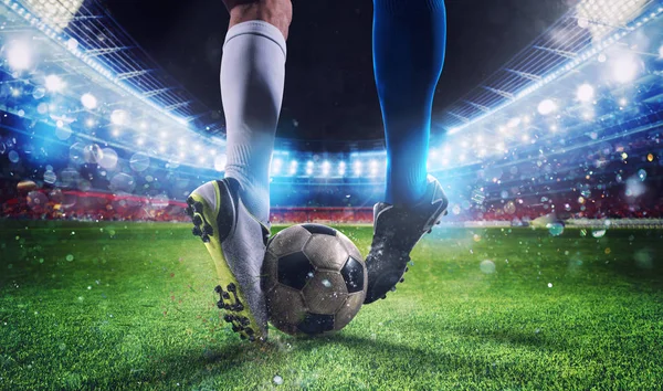 Soccer players with soccerball at the stadium during the match — Stock Photo, Image