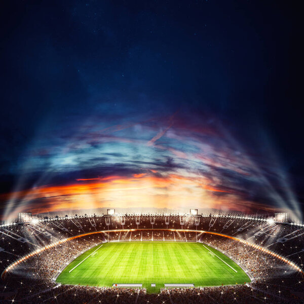 Вид сверху футбольного стадиона ночью с включенными огнями. 3D рендеринг
