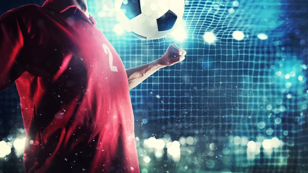 Jogador atacante controla a bola perto do gol de futebol — Fotografia de Stock
