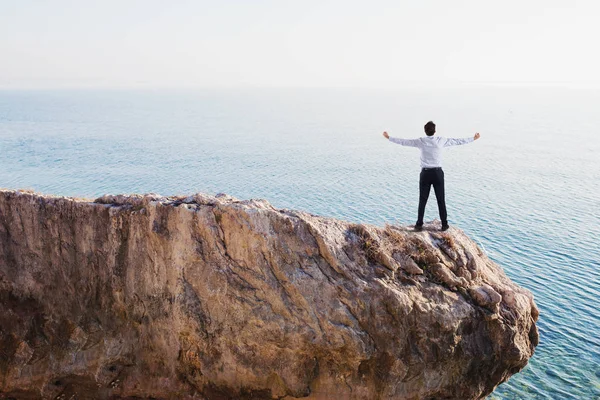 Freedom successful businessman over a high mountain — Stock Photo, Image
