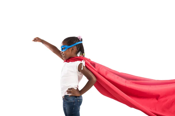 Child acts like a superhero to save the world — Stock Photo, Image