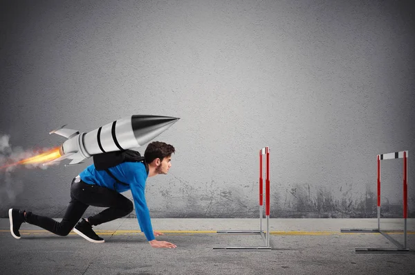 Student overcomes obstacles of his studies at top speed with a rocket — Stock Photo, Image