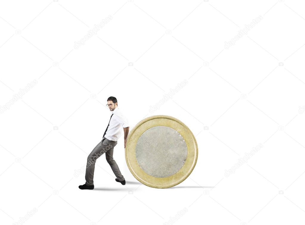 Businessman moves a coin. concept of difficulty to saving money
