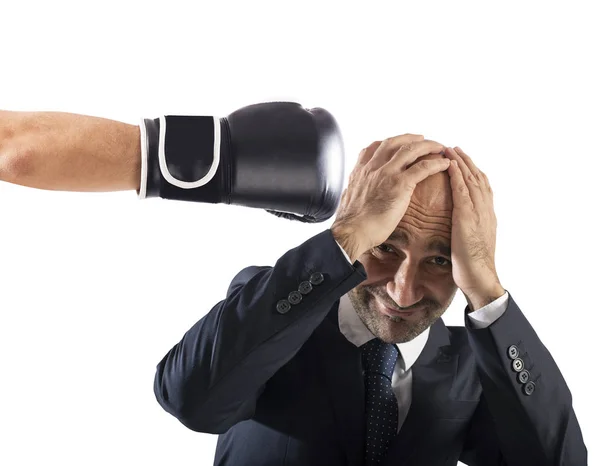 Businessman receives fists from competitors. concept of difficult career — Stock Photo, Image