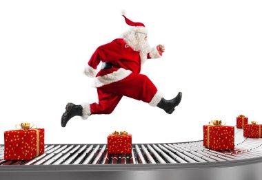 Noel Baba Noel zamanında teslimatları düzenlemek için konveyör bant üzerinde çalışır
