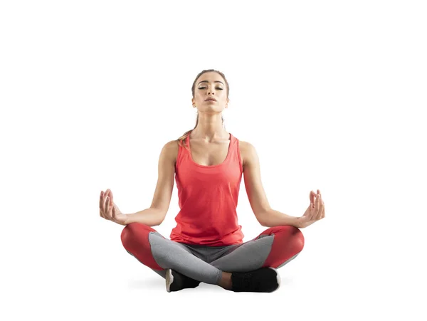 Chica joven relajándose en posición de yoga. Aislado sobre fondo blanco — Foto de Stock