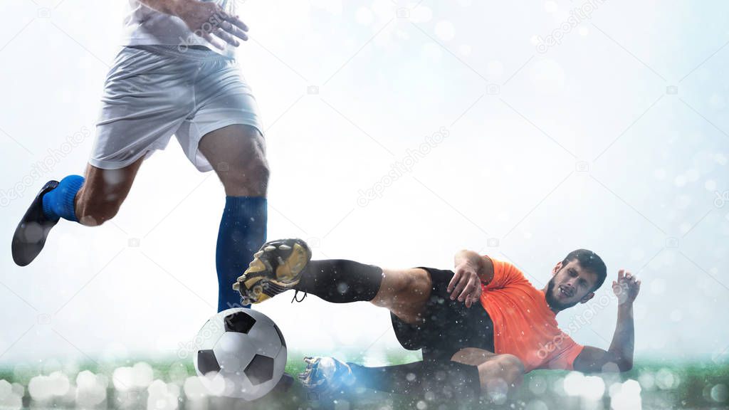 Close up of a football action scene with competing soccer players on white background