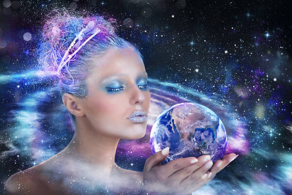 Lady universe that holds the world. Earth provided by Nasa