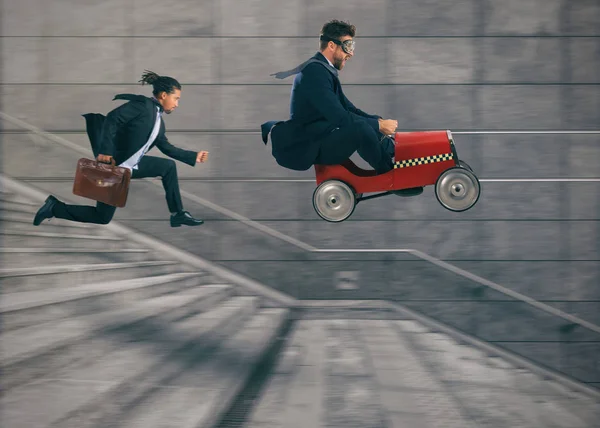 Reckless business man races with a car to win a competition against the competitors. Concept of success and competition — Stock Photo, Image
