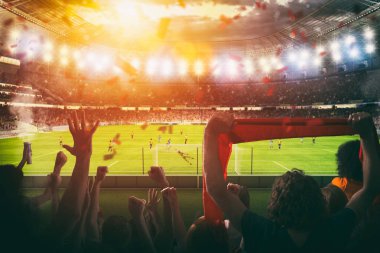Stadyumdaki taraftarların tezahürat yaptığı futbol maçı.