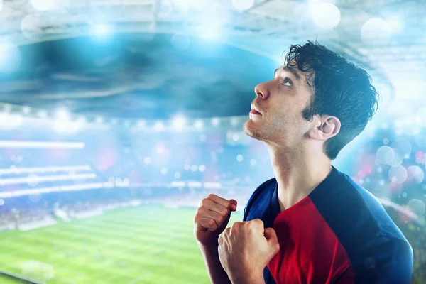 Football fan at the stadium with victory gesture — Stock Photo, Image