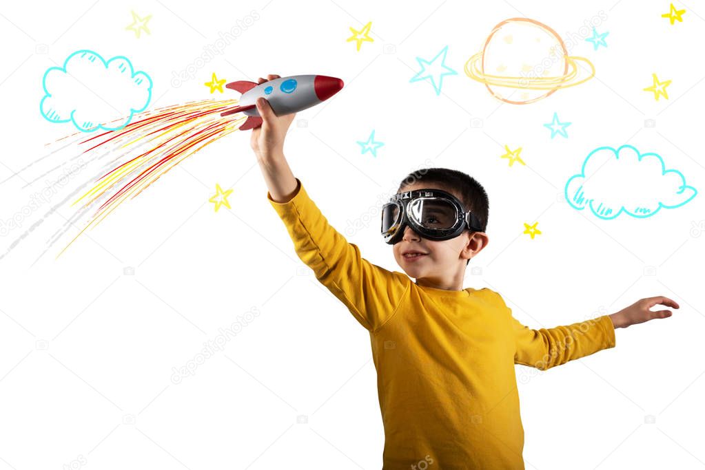 Child plays with a rocket. Concept of imagination. Isolated on white background