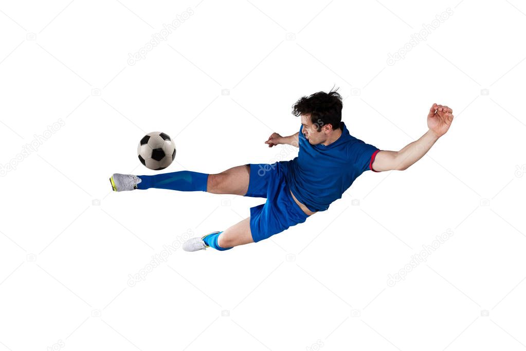 Football scene at night match with player kicking the ball with power. Isolated on white background