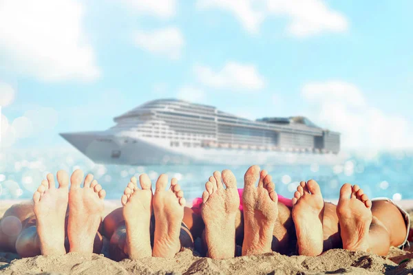 Group of friends having fun on the beach with their foots. Concept of summertime. — Stock Photo, Image