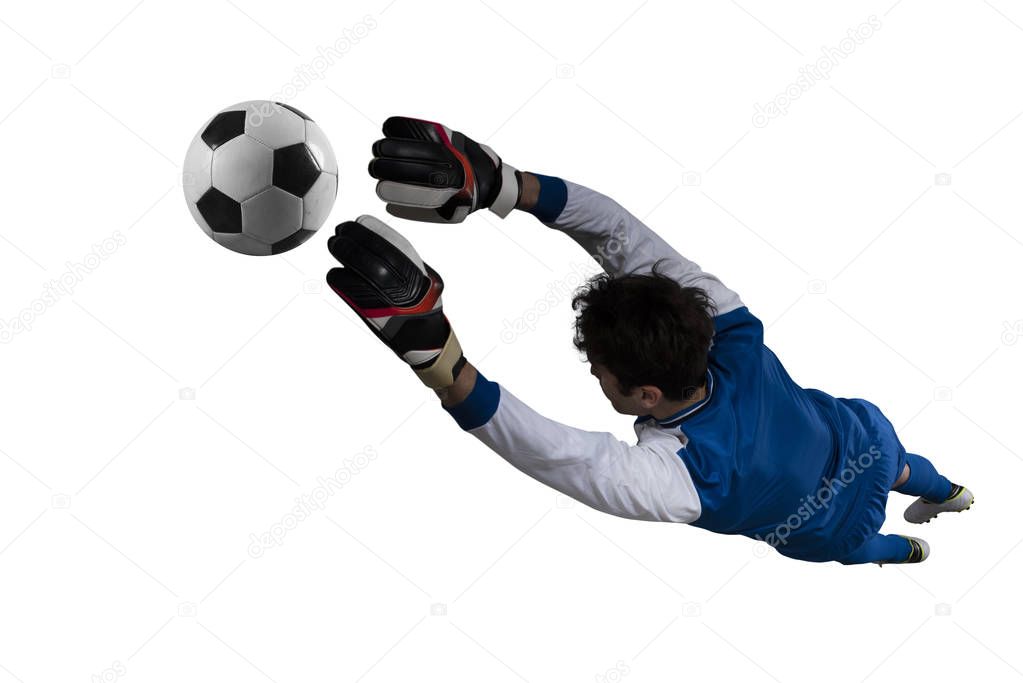 Goalkeeper catches the ball in the stadium during a football game. Isolated on white background