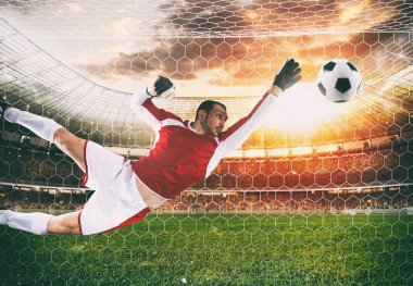 Kaleci bir futbol maçı sırasında topu stadyumda yakalar.