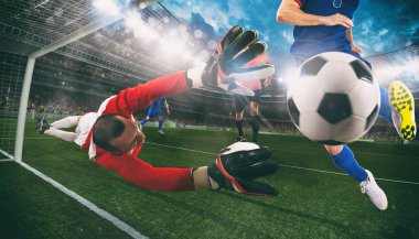 Kaleci bir futbol maçı sırasında topu stadyumda yakalar.