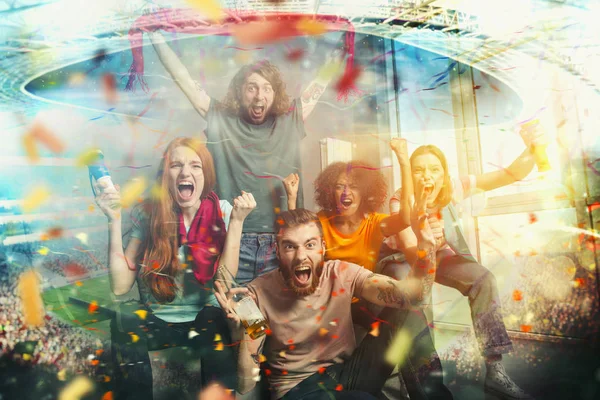 Happy friends of football fans watching soccer on tv and celebrating victory — Stock Photo, Image