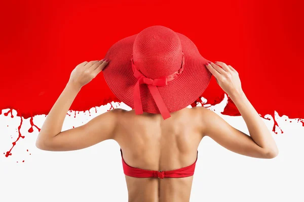 Girl dresses a swimsuit and hat in red style — Stock Photo, Image