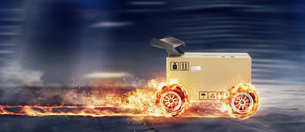 Priority Cardboard box with racing wheels on fire. Fast shipping by road. — Stock Photo, Image